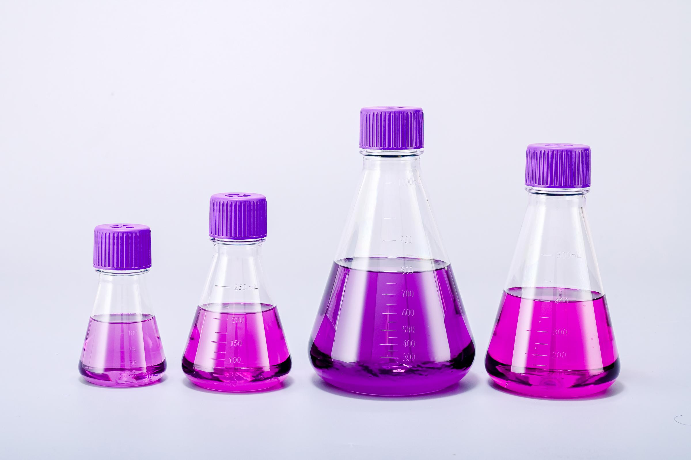 What are the advantages of using glass conical Erlenmeyer flasks in laboratory experiments?